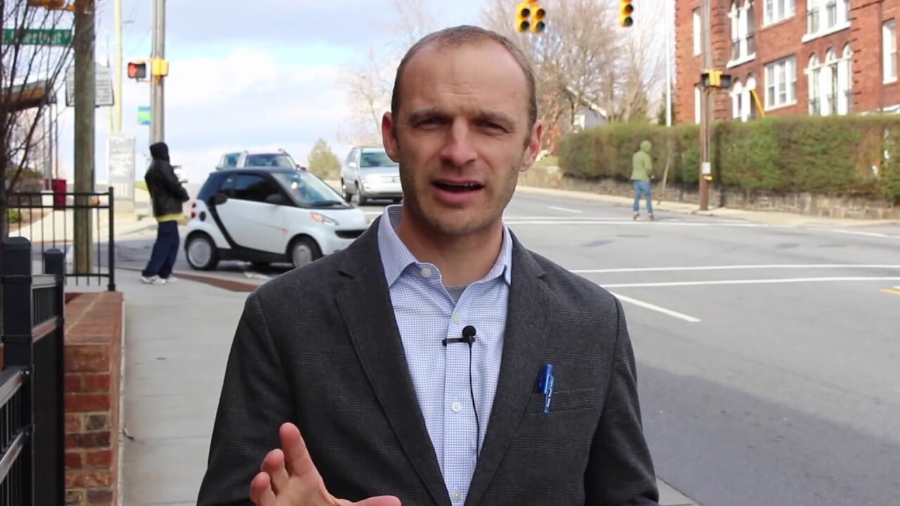 Lakota Denton at Merrimon Avenue in Asheville for dangerous roads campaign