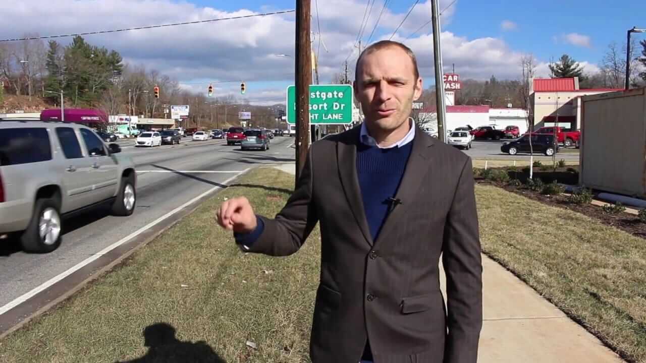 Lakota Denton on Patton Avenue in Asheville explaining dangerous roads for car accidents